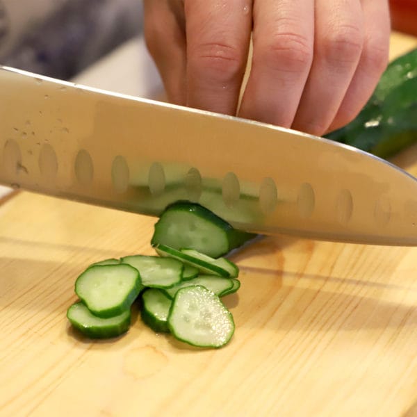 Kyoto Katsugu Stainless Steel Santoku Knife, 30.5 cm - Cutting Cucumber
